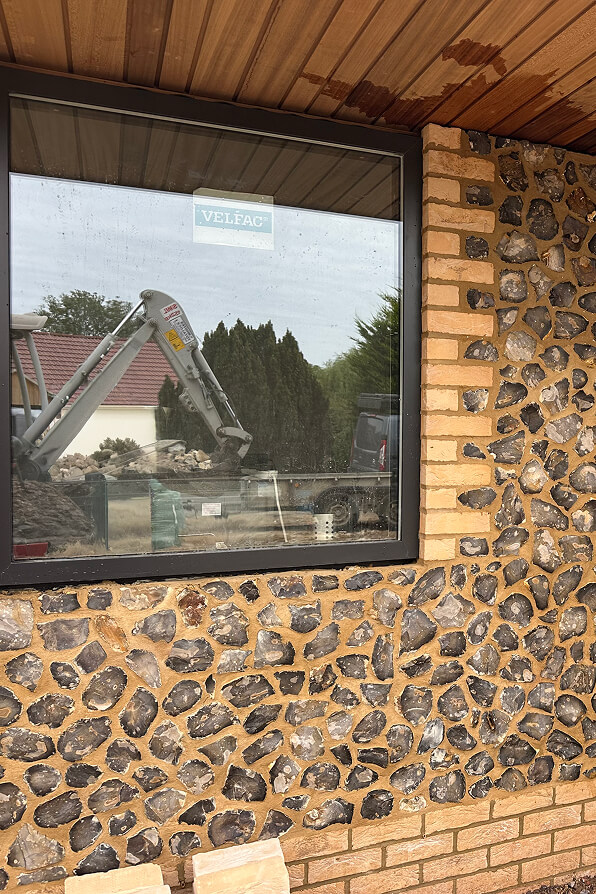 Flintwork house exterior window detail